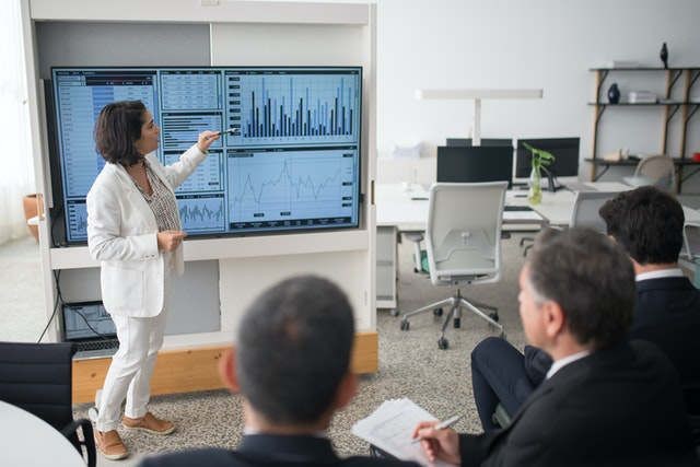 Woman with PowerPoint presentation